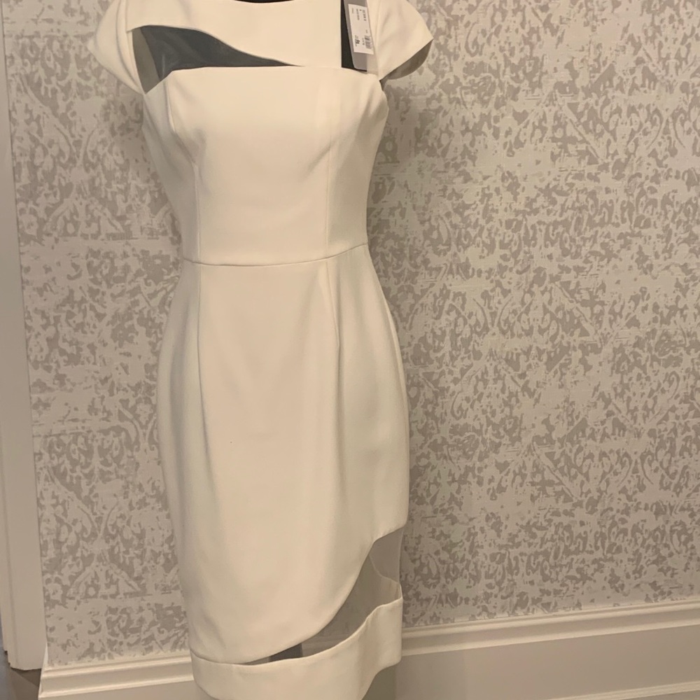 Black Halo dress , designer worn by Meghan Markle.